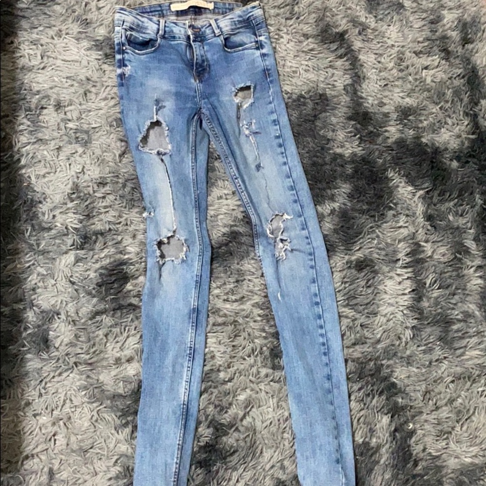 Blue ripped jeans
